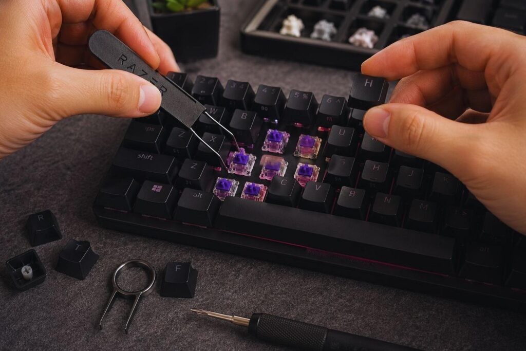 Informational: User wants to discover features, reviews, and setup guides for the Razer Huntsman Mini gaming keyboard.